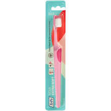 Load image into Gallery viewer, TePe Extra Soft toothbrush in pink with packaging on a white background
