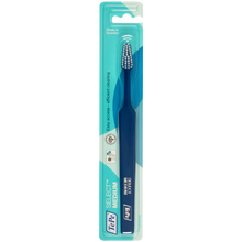 Load image into Gallery viewer, The Tepe Select Medium toothbrush in its packaging.
