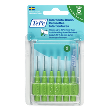 Load image into Gallery viewer, TePe Interdental Brush set in clear plastic packaging, featuring six green-handled interdental brushes with metal tips and a blue-and-white header card.
