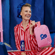 Load image into Gallery viewer, A Woman using the AND Beauty Glow Up Kit 
