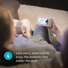Load image into Gallery viewer, Parent viewing baby on the Angelcare AC25-1 4.3-inch video monitor
