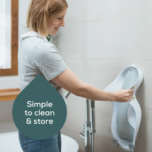 Load image into Gallery viewer, Angelcare Soft Touch Mini Baby Bath Support being stored after cleaning
