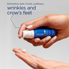 Load image into Gallery viewer, Hands dispensing Neostrata Intensive Eye Therapy to treat dark circles, puffiness, wrinkles, and crow's feet.

