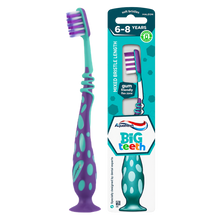 Load image into Gallery viewer, Aquafresh Big Teeth children's toothbrush for ages 6 to 8 years, featuring a purple handle with lime green wavy grip patterns and a suction foot, shown next to its teal retail packaging highlighting a brush head with mixed bristle lengths.

