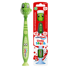 Load image into Gallery viewer, Aquafresh Little Teeth children's toothbrush for ages 3 to 5 years, featuring a green dinosaur-themed handle with scaled details, a suction cup foot, and a matching green animal travel cap, shown next to its red retail packaging.
