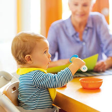 Load image into Gallery viewer, Baby using Munchkin Scooper Spoons at table
