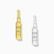 Load image into Gallery viewer, Crescina HFSC Complete Treatment featuring a gold Re-Growth ampoule and a clear Anti-Hair Loss ampoule, designed for targeted scalp care.
