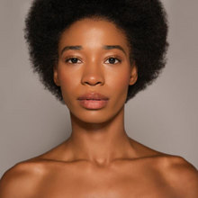 Load image into Gallery viewer, Model with hydrated lips and natural glow after applying Dr.PAWPAW Shea Butter Balm
