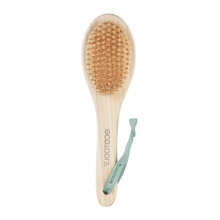 Load image into Gallery viewer, EcoTools foot scrubber tool showing the soft synthetic bristle side for cleansing feet.
