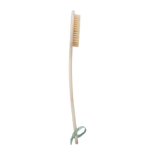 Load image into Gallery viewer, Side profile of the EcoTools bamboo bristle bath brush showing the curved ergonomic handle and bristle head.
