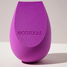 Load image into Gallery viewer, Upright studio product shot of the EcoTools BioBlender makeup sponge on a neutral surface.
