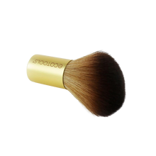 Load image into Gallery viewer, Angle view of the EcoTools Contour Buki Brush showing the soft synthetic bristles and gold handle on a white background.
