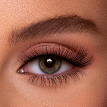 Load image into Gallery viewer, Eyecha Ocean False Lashes worn on eye showing a lengthening winged cat-eye effect
