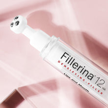 Load image into Gallery viewer, Close-up of the Fillerina 12 HA Densifying-Filler Lips and Mouth product, highlighting the three-ball massaging applicator and the Lips and Mouth Filler label.
