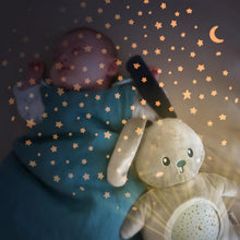 Load image into Gallery viewer, Mimi Bunny Plush Projector in use, projecting a calming starry night sky to help a baby sleep peacefully.
