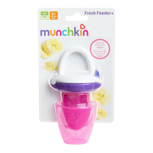 Load image into Gallery viewer, Munchkin Fresh Feeder Plus in pink with mesh pouch and snap-on cap, shown in original retail packaging, for babies 6 months and older.
