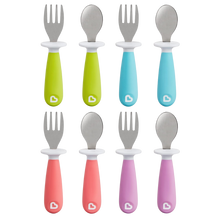 Load image into Gallery viewer, Munchkin Raise Toddler Fork and Spoon Set in assorted colours, featuring ergonomic handles and built-in utensil rests to keep tips off dirty surfaces for improved hygiene.

