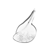 Load image into Gallery viewer, A close-up texture swatch of a clear, lightweight gel product on a white background. The gel has a distinct drop shape with a curved tail, showing a clear, smooth consistency with small air bubbles visible within the texture.
