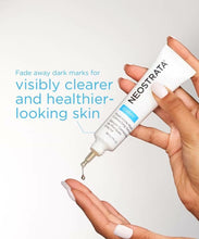 Load image into Gallery viewer, A hand holding and squeezing a drop of Neostrata Clarify Post-Acne Mark Correcting Serum onto the other hand. Text reads: &quot;Fade away dark marks for visibly clearer and healthier-looking skin&quot;.
