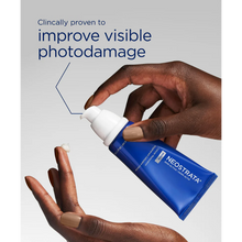 Load image into Gallery viewer, Hands dispensing NeoStrata Skin Active Cellular Restoration cream with a clinical claim for improving photodamage.
