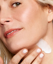 Load image into Gallery viewer, Close-up of Neostrata Triple Firming Neck Cream being applied to the neck to visibly firm and smooth the skin.
