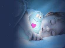 Load image into Gallery viewer, Close-up of a child cuddling the Pabobo Lumilove Barbapapa nightlight, highlighting its soft glow and comforting presence for children while they sleep.

