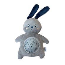 Load image into Gallery viewer, The Pabobo Mimi Bunny Plush Projector, a soft grey plush bunny with blue ears and a built-in star and moon projector panel.
