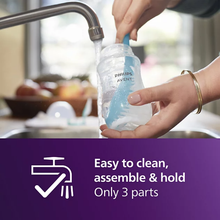 Load image into Gallery viewer, Philips Avent Natural Response baby bottle being cleaned with a bottle brush
