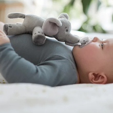 Load image into Gallery viewer, Side view of a baby soothing with a Philips Avent elephant plush pacifier, available with free delivery across Malta &amp; Gozo.
