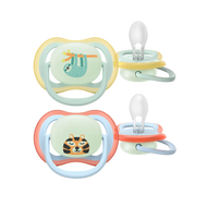 A 2-pack of Philips Avent Ultra Air Night Time soothers (0-6m) featuring a glow-in-the-dark button with sloth and tiger designs and large air holes for skin comfort.
