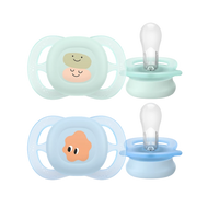 A two-pack of Philips Avent Ultra Air pacifiers in light green and blue, featuring cute character illustrations and breathable shields against a black background.