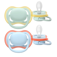 A 2-pack of Philips Avent Ultra Air soothers for boys 0–6m in mint green and light blue, featuring extra-large airholes for skin ventilation and symmetrical silicone teats.