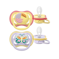 A 2-pack of Philips Avent Ultra Air soothers for girls 0–6m featuring toucan and butterfly designs with extra-large airholes for skin breathability.