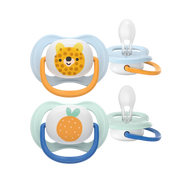 Philips Avent Ultra Air Soother 2-pack (0-6 months) with animal and fruit-themed designs (tiger face and orange fruit), featuring an orthodontic nipple and breathable design for sensitive baby skin.