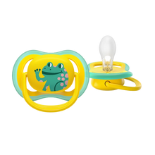 Load image into Gallery viewer, A close-up of a yellow and green Philips Avent Ultra Air soother for toddlers 18 months and older, featuring a waving green frog character and a clear silicone nipple.
