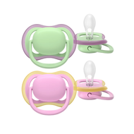 Philips Avent Ultra Air Soother 2-pack (6-18 months) in solid colors (pink and green), featuring an orthodontic nipple and breathable design for sensitive baby skin.