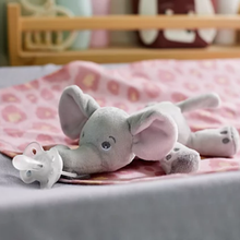 Load image into Gallery viewer, Close-up view of the Philips Avent ultra soft snuggle elephant plush toy resting on a pink blanket, available with free delivery across Malta &amp; Gozo.
