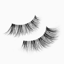 Load image into Gallery viewer, Close-up of Pinky Goat KEONA lashes showing short length and wispy texture with clear band.
