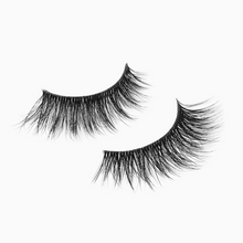 Load image into Gallery viewer, MIA lash pair on a white background showing ultra-curly and natural volume.
