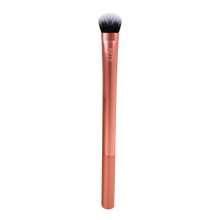 Load image into Gallery viewer, Real Techniques RT 210 Expert Concealer Makeup Brush with a metallic orange handle and dense synthetic bristles, isolated on a white background.
