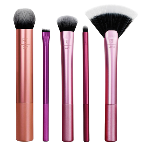 The Real Techniques Artist Essentials 5-Piece Brush Set, featuring the Fan Brush and brushes for flawless foundation, highlight, contour, and precise eye makeup application.