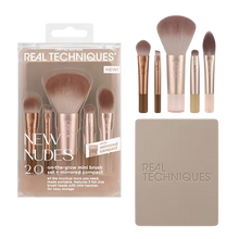 Load image into Gallery viewer, Packaged Real Techniques New Nudes 2.0 On-The-Glow Mini Brush Set with mirrored compact displayed alongside the included five mini makeup brushes.
