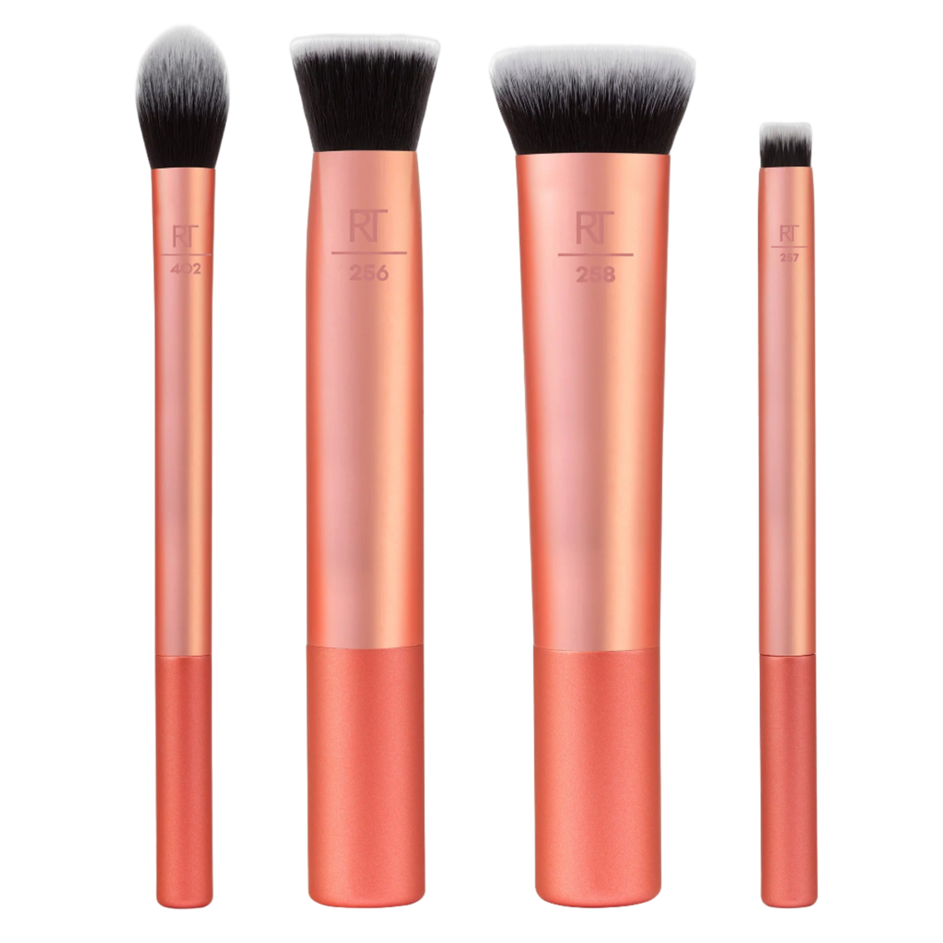 Real Techniques Face Base 4-Piece Brush Set, showcasing copper-handled brushes (RT 258, RT 256, RT 242) for applying, blending, and detailing foundation and concealer for a flawless complexion.