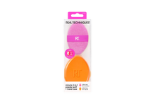 Load image into Gallery viewer, Packaging for the Real Techniques Miracle 2-in-1 powder puff with travel case, featuring a pink puff for powder and an orange sponge for liquid makeup application.
