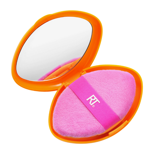 The Real Techniques Miracle 2in1 Powder Puff, showing the pink plush velour side for setting powder and the orange sponge side for liquid foundation or cream makeup.