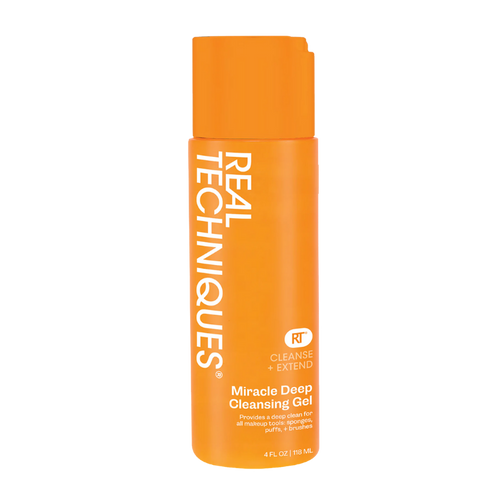 Real Techniques Miracle Deep Cleansing Gel in orange bottle for makeup brushes and sponges.
