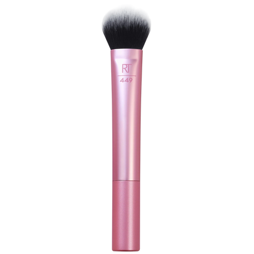 Real Techniques RT 449 Tapered Cheek Brush with a pink handle and small, dense, tapered head, ideal for controlled application of highlighter, contour, or precise blush placement.