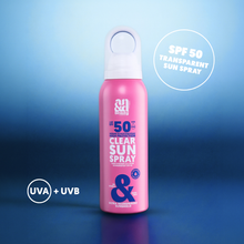 Load image into Gallery viewer, A pink bottle of Clear Sun Spray SPF 50 against a blue background, highlighting UVA and UVB protection.
